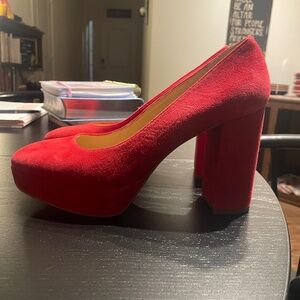 Red suede platform heels